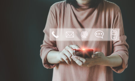 Hand Using Smartphone for Connect a Community, contact icons email, address, live chat, internet wifi. Metaverse, Technology Concepts. Contact us or Customer support hotline people connect.の写真素材