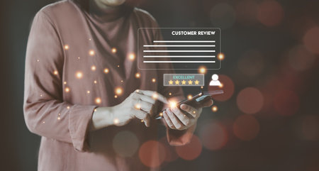 Woman customer review satisfaction excellent feedback survey concept. User give rating to service experience online application. Evaluate quality of service leading to reputation ranking of business.の写真素材