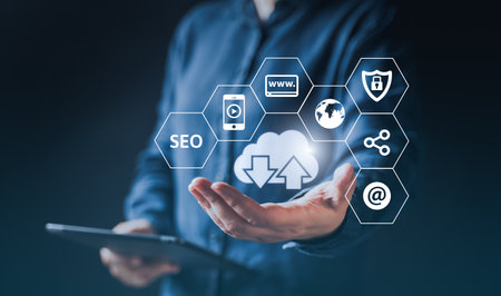 Businessman use Laptop with cloud computing diagram show on hand. Cloud technology. Data storage. Networking confidential data of business and internet service concept. internet banking, password.の写真素材