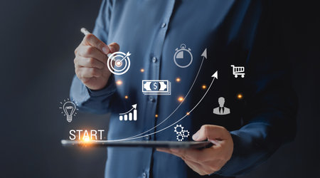 Startup concept with icon business and network connection on modern virtual interface from digital tablet. man touching on tablet.の写真素材