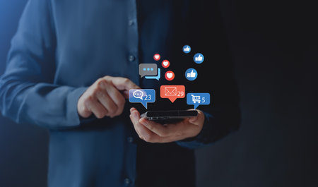Social media and digital online concept, woman using smart phone. The concept of living on vacation and playing social media. Social Distancing ,Working From Home concept.の写真素材