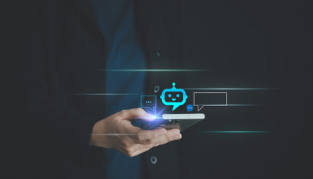 Chatbot,AI Artificial Intelligence. Man chatting with digital assistant bot on mobilephone,digital communication technology. Future of business smart app service, online messaging, innovation network.の写真素材