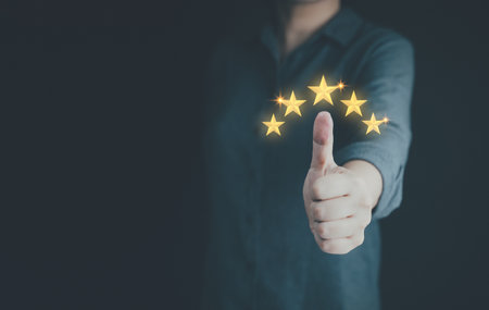 Satisfaction guarantee, customer give 5 stars rating, review positive feedback, best service. Concept of survey, vote score, opinion, customer questionnaire, perfection selection choice, best feedbackの写真素材