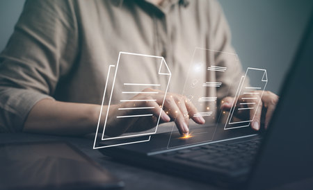 Document management system, DMS. Woman use laptop in business arrange database folder in office. Concept of cyberspace security software use in paperwork on cloud server, documentation platform reportの写真素材