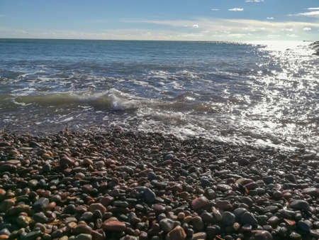 Small stone beach bathed by the waters of the Mediterranean Sea