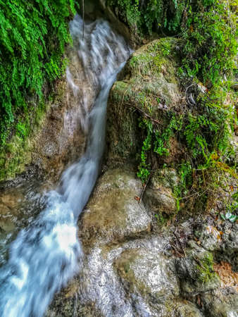 View of small waterfall in the natural landscape of La Floresta in the village of Viverの写真素材