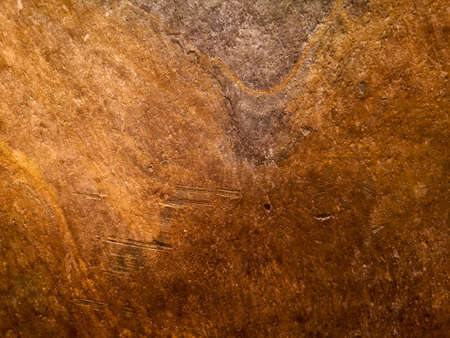 Natural rock background in brown and purple tones