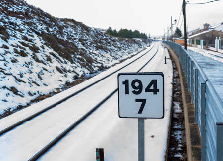 Snowy train tracks in the town of Barracasの写真素材