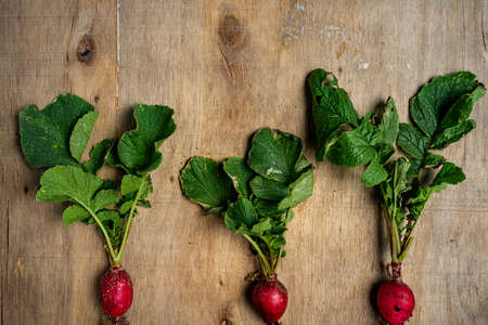 Fresh vegetables in composition on old wooden background. Healthy conceptの写真素材