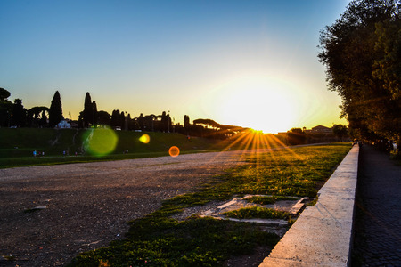 Sunset at Circus Maximus in Rome, Italy. Beautiful sunset in an archeological park in the middle of Rome.の写真素材