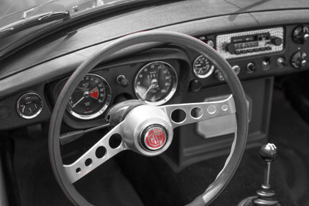 Vianden, Luxembourg; 08/12/2018: desatured picture of the steering wheel and speedometer in the...