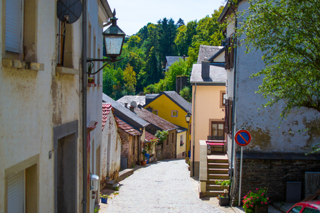 Typical street in the old town of Vianden, in Luxembourg, Europe, with colorful houses.の写真素材