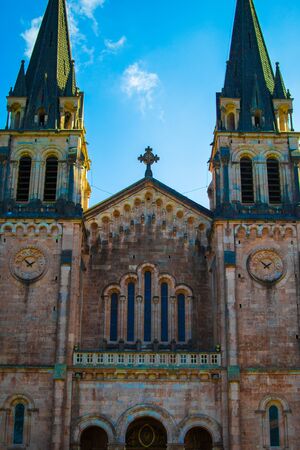Facade of the Basilica de Santa Maria la Real de Covadonga (or Basilica of Covadonga) in Cangas de Onis, Asturias, Spain. Popular holy icon of the reconquest of Spain by Pelayoの写真素材