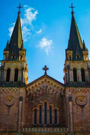Facade of the Basilica de Santa Maria la Real de Covadonga (or Basilica of Covadonga) in Cangas de Onis, Asturias, Spain. Popular holy icon of the reconquest of Spain by Pelayoの写真素材