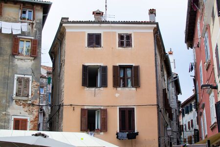 Facade of typical croatian colorful house in the picturesque old town of Rovinj, in Croatiaの写真素材