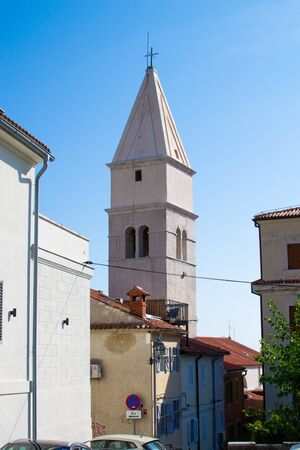 Tower of the Piran Minorite Monastery in the old town of Piran, in Sloveniaの写真素材