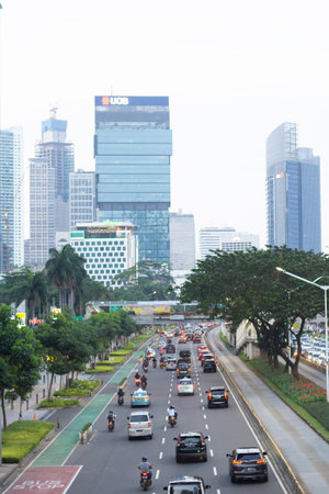 The busy cityscape in Sudirman Kuningan Jakarta with heavy traffic on the main roads, Jakarta,...