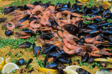 Giant pan of Paella cooking in London's Borough Market, UKの写真素材