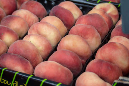 Fresh Peaches on Sale in Borough Market, Southwark, London UKの写真素材