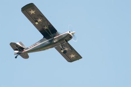 Aircraft flying to airportの写真素材
