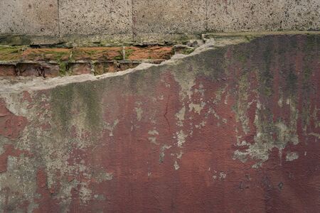 Abstract background old crumbling brick wallの写真素材
