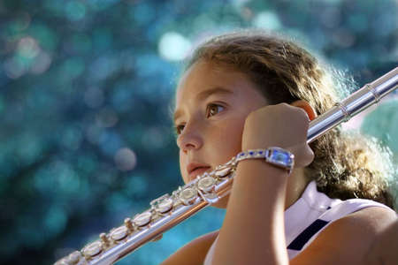 Girl with a fluteの写真素材
