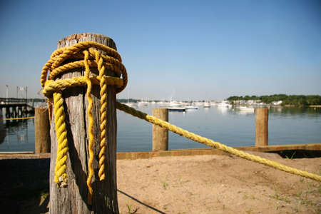Old yellow rope at marina
