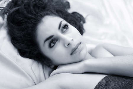 Beautiful dreamy girl in blueの写真素材