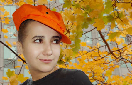 Autumn portrait of a cute girl