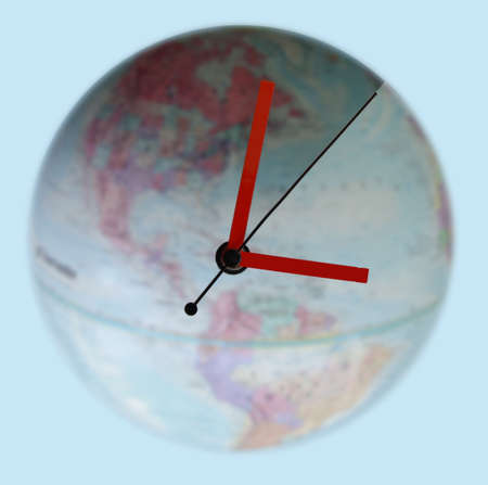 Clock on a globeの写真素材