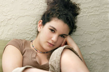 Teenage girl thinkingの写真素材