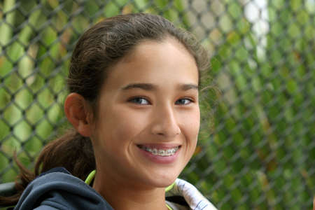 Happy teen girl with braces