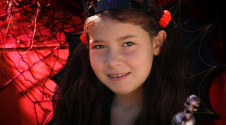 Cute girl in a Halloween costume
