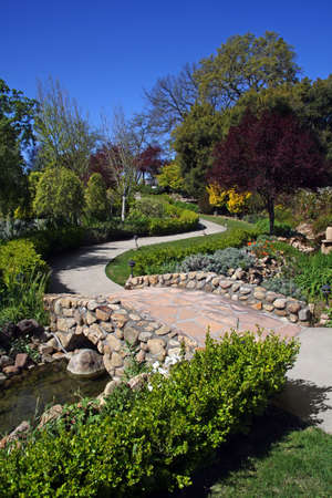 Green path in a beautiful garden の写真素材