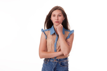 Beautiful girl dancing in the camera, posing against white background. Different poses and emotions. Standing, moving, smiling. playful dances, choreography. Brunette with long hair, slender, cheerful and charismaticの写真素材