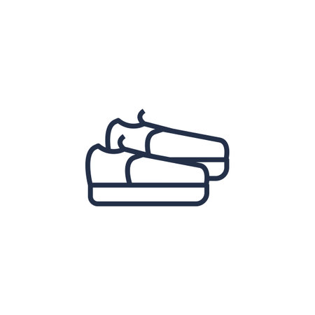 Linear icon of pair of men boots with thick soles. Casual clothes and shoes. Wardrobe item to create modern fashionable look. Simple dark gray vector symbol isolated on white backgroundのイラスト素材