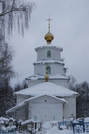Orthodox Church in the winter in the cemeteryの写真素材