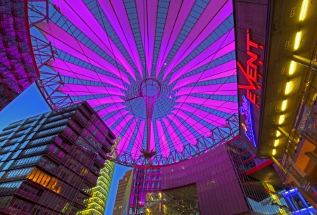 Berlin, Potsdamer Platz, May 20th, 2012 - Purple illuminated roof amongst office buildings and cinema at modern Potsdam Squareのeditorial素材