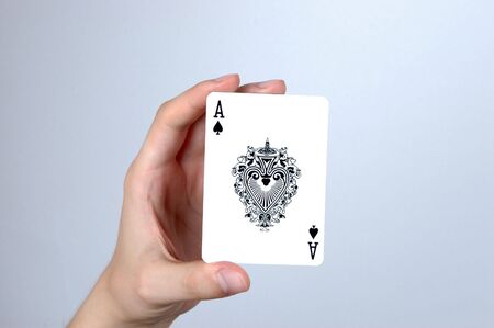 Hand holding single highest card - ace.のeditorial素材