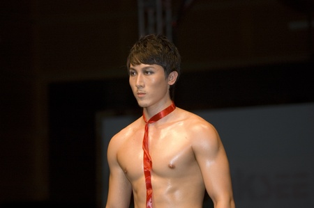 CHINA, SHENZHEN, GUANGDONG PROVINCE - APRIL 5, 2009:  The Fourth Shenzhen International Brand Underwear Fair with fashion show. Female and male models presents underwear and sexy costumes.のeditorial素材