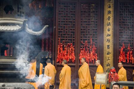CHINA, SHANGHAI - MARCH 20: Jade Buddha Temple in Shanghai. Buddhist monks gathering for mourning mass on March 20, 2010.のeditorial素材