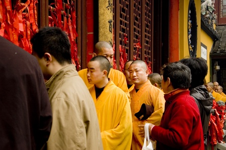 CHINA, SHANGHAI - MARCH 20: Jade Buddha Temple in Shanghai. Buddhist monks gathering for mourning mass on March 20, 2010.のeditorial素材
