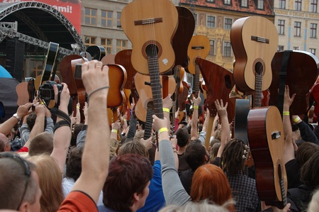 WROCLAW, POLAND - April 30: Guitars World Guinness Record, 5601 participants gather in front of Wroclaw's Town Hall on April 30, 2011 to beat guitar mass participation record.  のeditorial素材