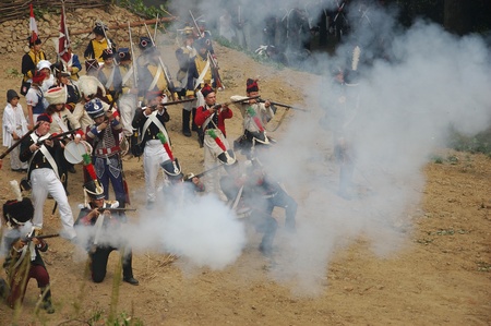 SREBRNA GORA, POLAND - JUNE 11: 1807 Napoleon's forces battle reconstruction, siege of the Srebrna Gora fortress. French side muskets fire on June 11, 2011.のeditorial素材