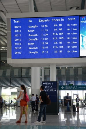 SHENZHEN, CHINA - SEPTEMBER 9:  Unidentified passangers wait inside newly built Shenzhen North station on September 9, 2012. Modern station designed for fast railway.のeditorial素材