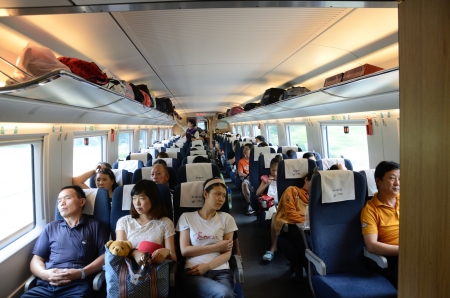 CHINA - SEPTEMBER 9:  Unidentified passangers travel inside fast train between Shenzhen and Wuhan cities on September 9, 2012. のeditorial素材