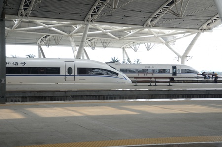 GUANGHZOU, CHINA - SEPTEMBER 9:  Fast train between Shenzhen and Wuhan stops in Guangzhou railway station on September 9, 2012. のeditorial素材