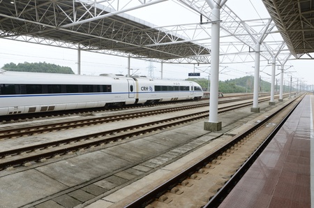 YUEYANG, CHINA - SEPTEMBER 9:  Fast train between Shenzhen and Wuhan stops in YueYang railway station on September 9, 2012. のeditorial素材