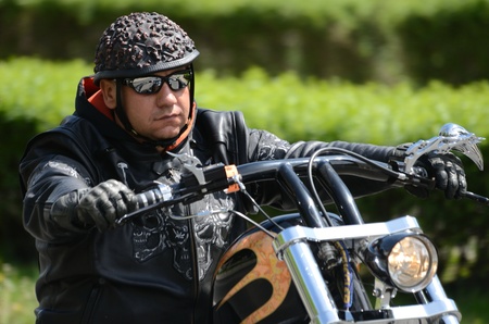 WROCLAW, POLAND - MAY 18: Unidentified motorcyclist rides Harley-Davidson motor during parade Super...