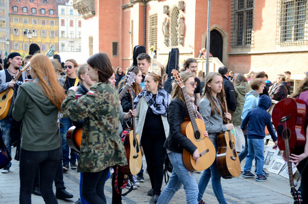 WROCLAW, POLAND - MAY 1: Unidentified guitarists coming back home with new Guitar Guiness Record...
